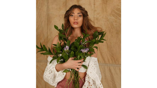 woman holding flowers, natural and non-toxic